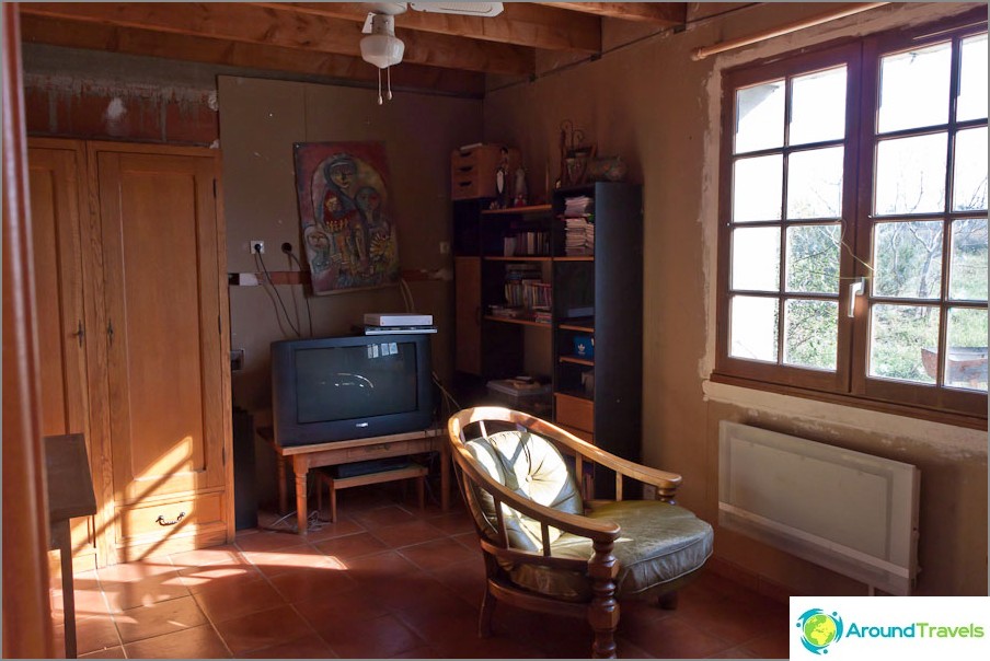 Modest but comfortably furnished room in a French house