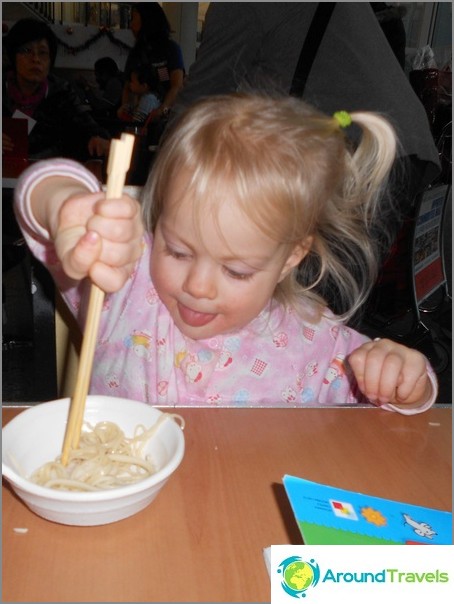 First experience with chopsticks (Hong Kong airport)