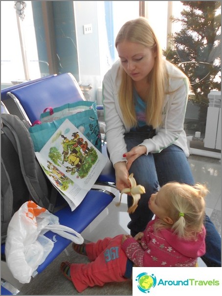 All at once: I feed and read a fairy tale while my daughter sits on the pot