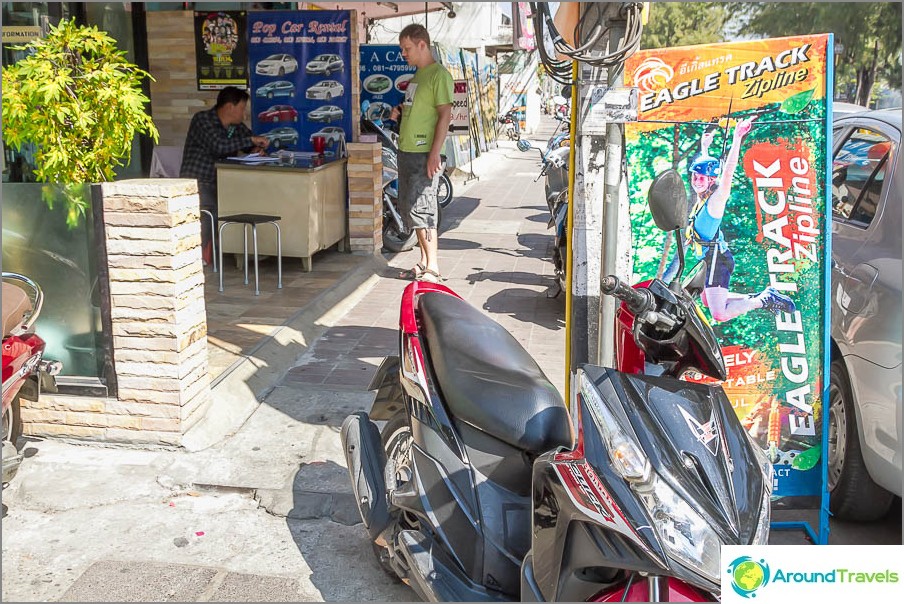 Pop Car Rental on the inside of the square