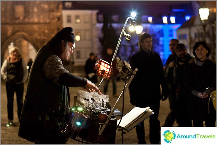 Amazing uncle who played on glasses of water. Old Prague, Charles Bridge.