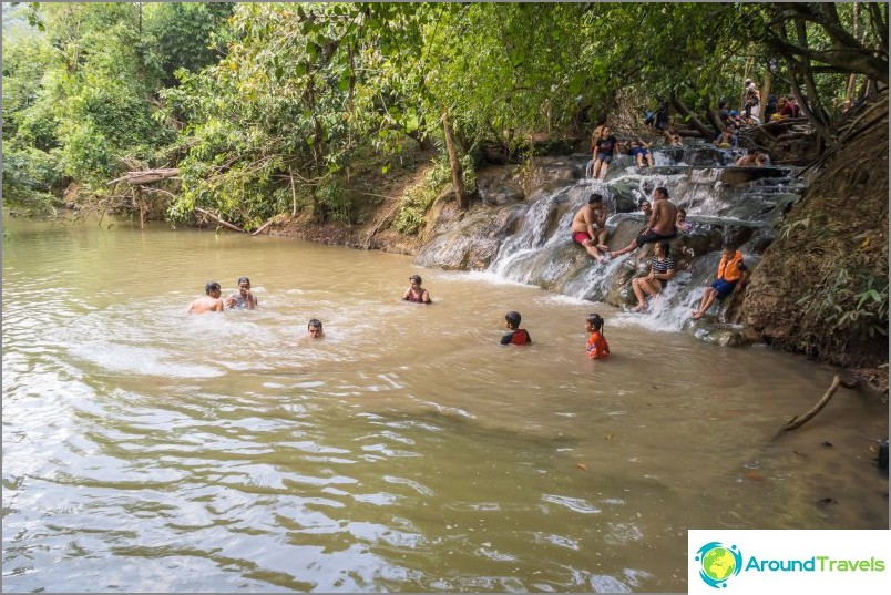 Water flows into the river, from the bottom of which hot streams also break through in places