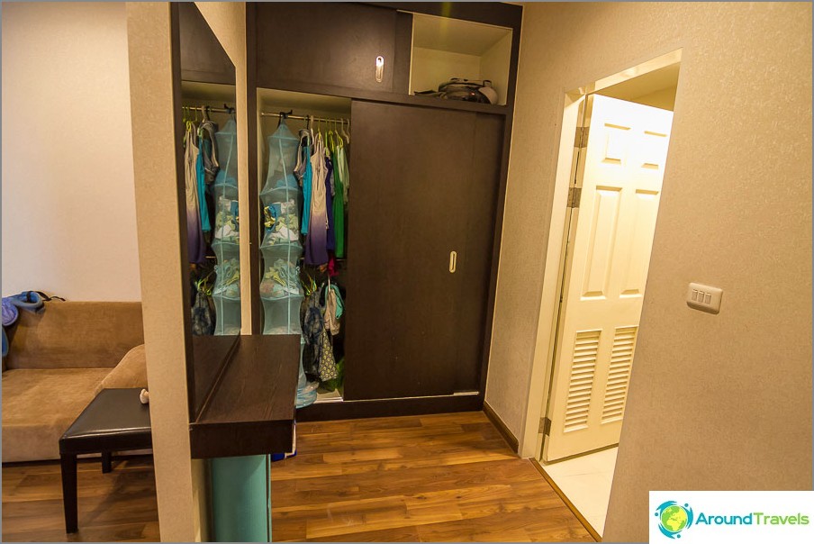 Nook with wardrobe and large mirror