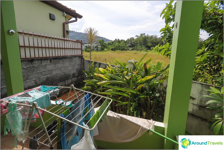 Exit from the bedroom to the balcony overlooking the green meadow