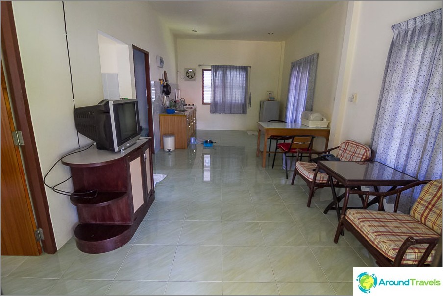 Large living room with kitchen