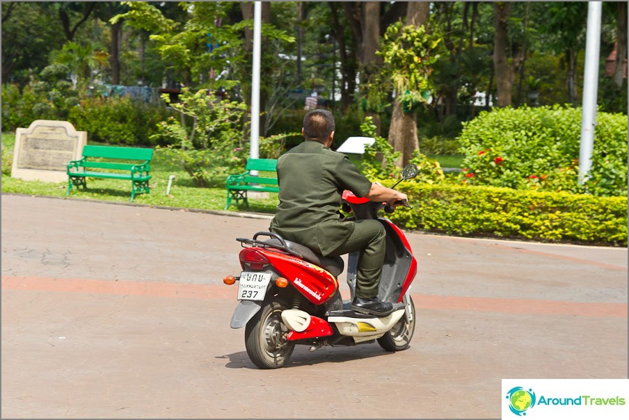 Guards ride bikes around the park