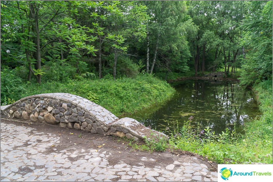 Bridge over a cascade of ponds