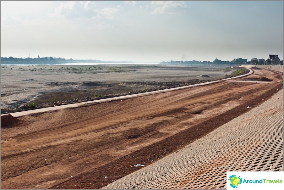 In the distance, the sacred and crushed Mekong