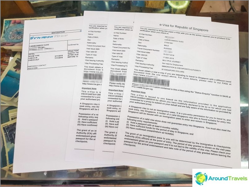 Printed visa and voucher before flying to Singapore to show to border guard