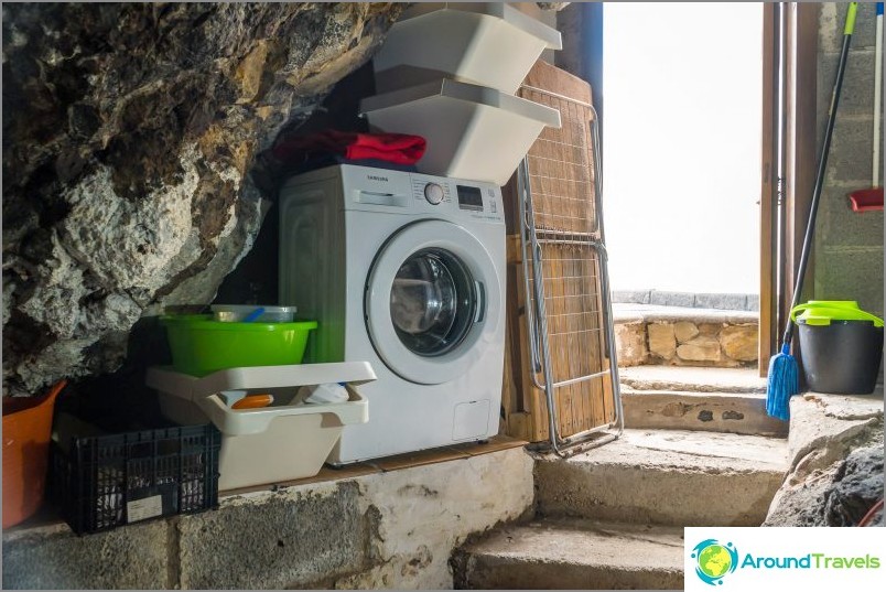 There is a washing machine in a separate cave