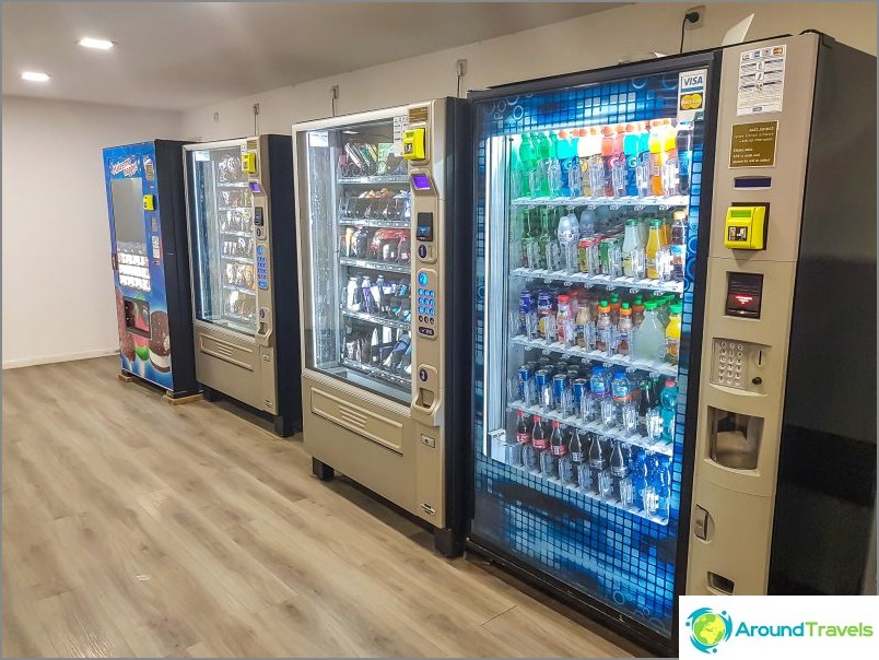 Vending machines with water and chocolates, prices like at the airport