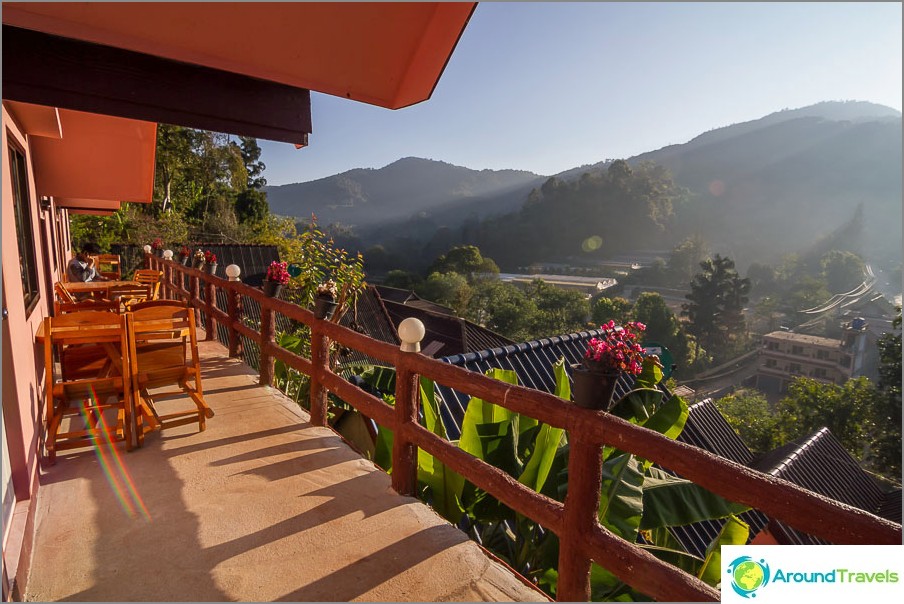 The veranda offers views of the mountains and the village